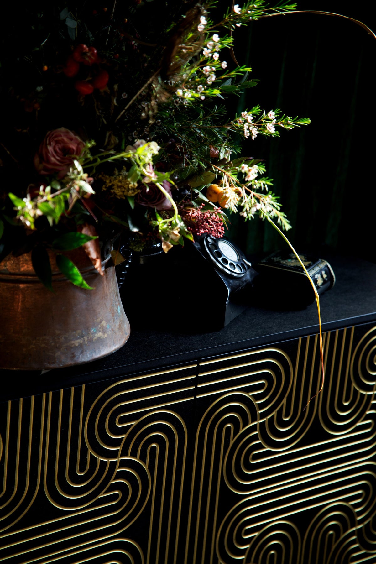 Detail of sideboard in Black, Gold and Walnut