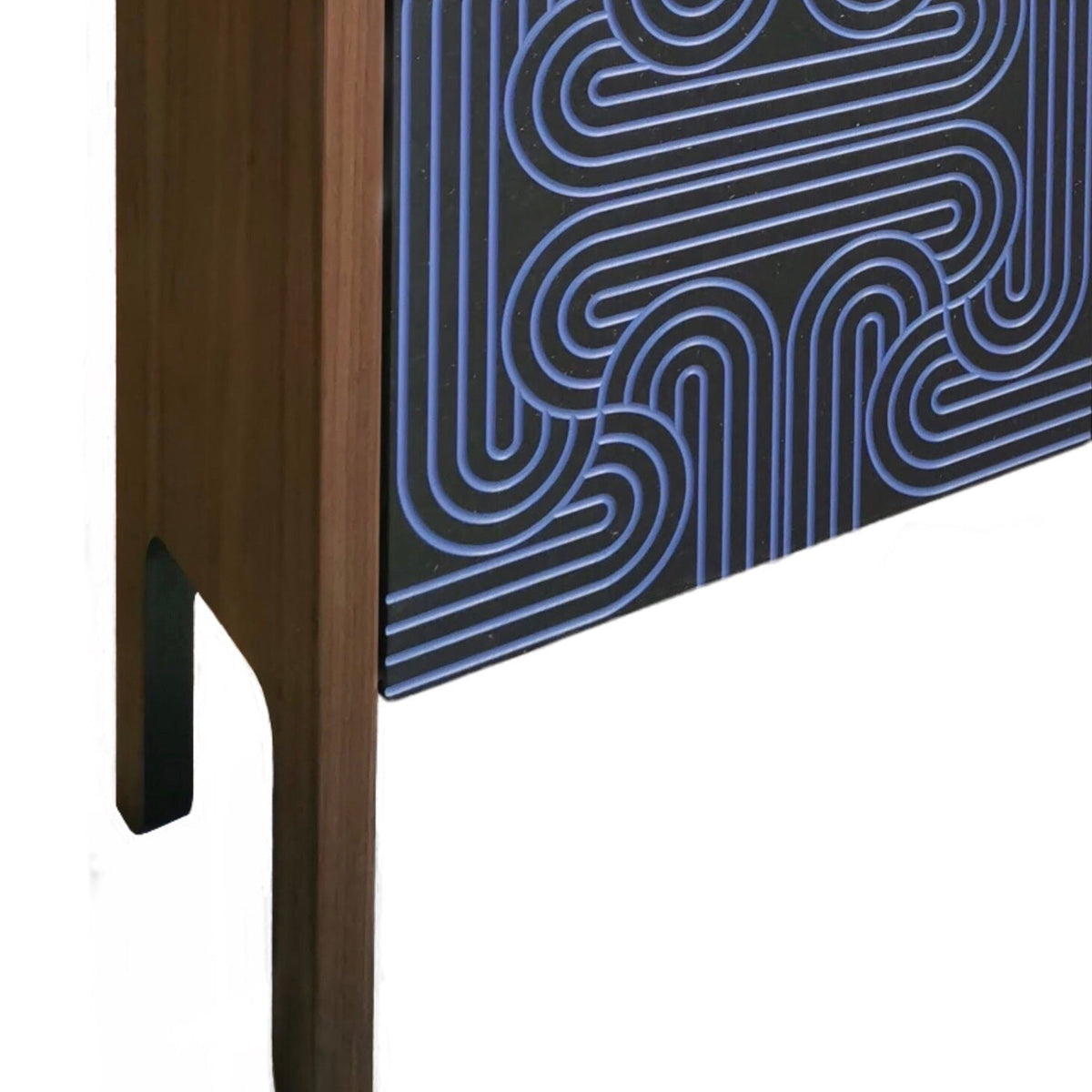 Close-up of a modern wooden cabinet or sideboard with dark brown wood legs and front panels featuring a blue and black geometric maze-like pattern, shown against a white background.