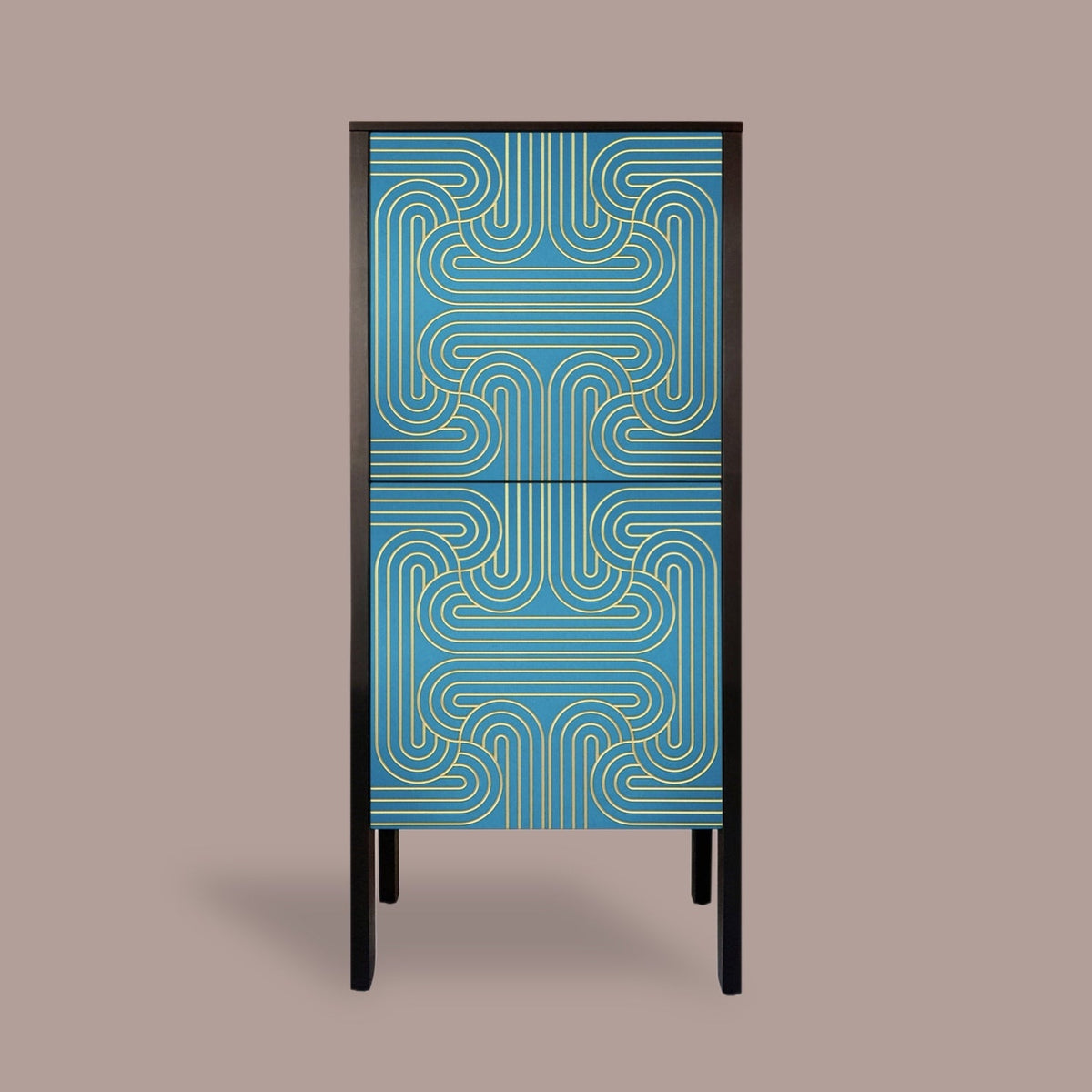 A modern two-door cabinet featuring a vibrant blue and teal geometric pattern on the doors, framed in black with slim black legs, set against a solid taupe background.