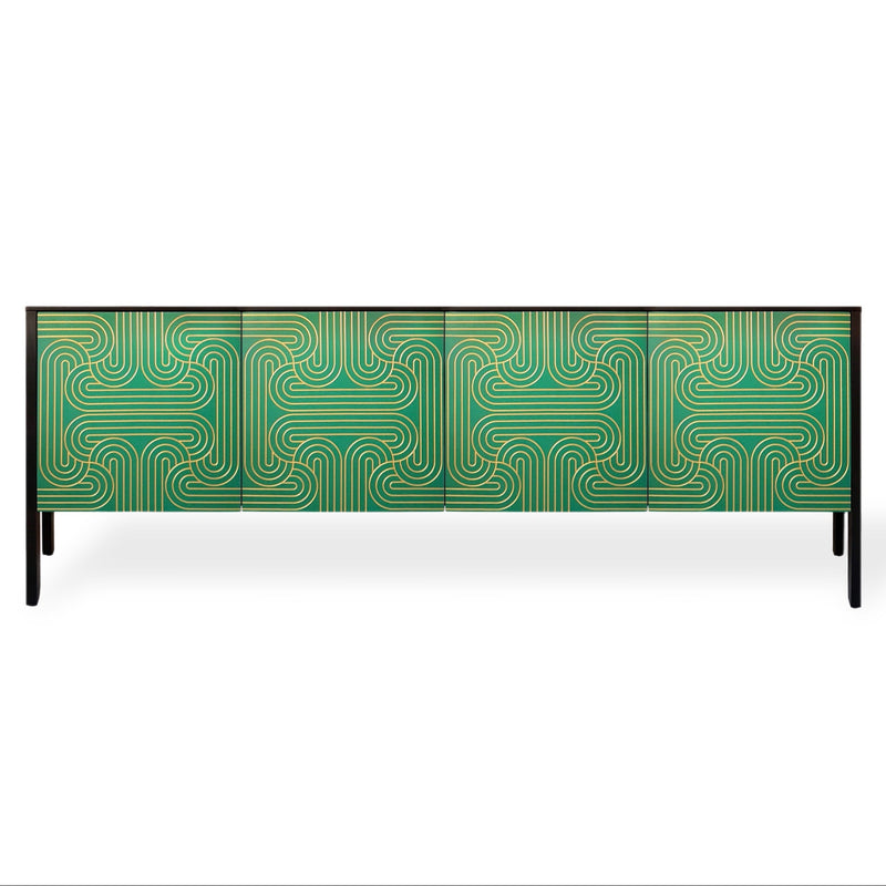 A modern sideboard or credenza with a green and teal geometric wavy pattern on the doors, supported by slim black legs, shown against a plain white background.