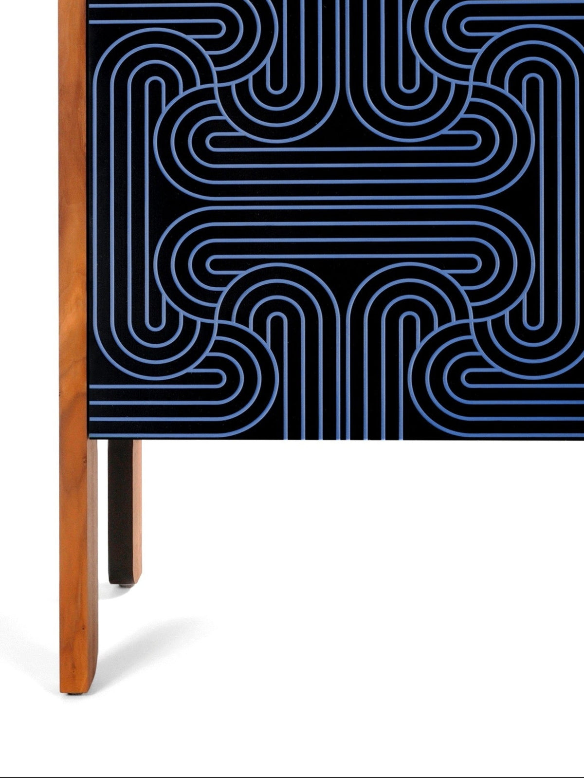 A modern sideboard or credenza with a black top and front featuring a blue and black geometric maze-like line pattern, supported by a light wood frame and single leg, shown against a plain white background.