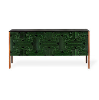 A modern sideboard or credenza with a black front featuring a green geometric maze-like line pattern, supported by slim wooden legs, shown against a plain white background.