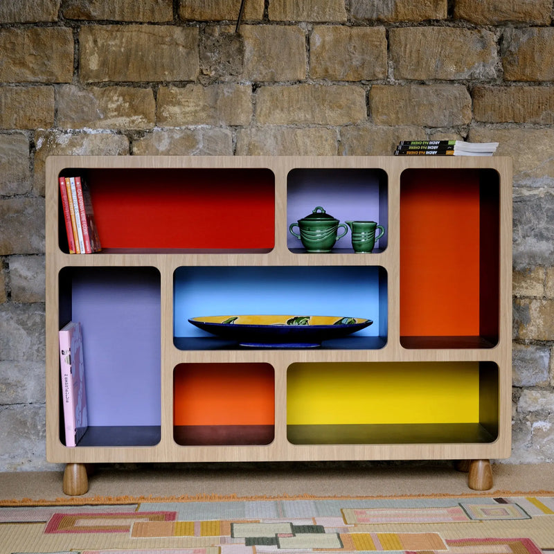 Display cabinet with multi coloured back. Boulder Display Unit