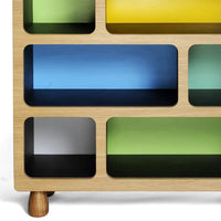 Display cabinet with Green, yellow and blue back. Boulder Display Unit Tall